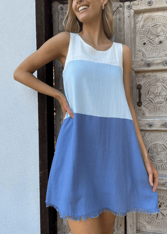 Women's Sleeveless A-line mini dress with a frayed hem and a color-block design in white, light blue, and navy