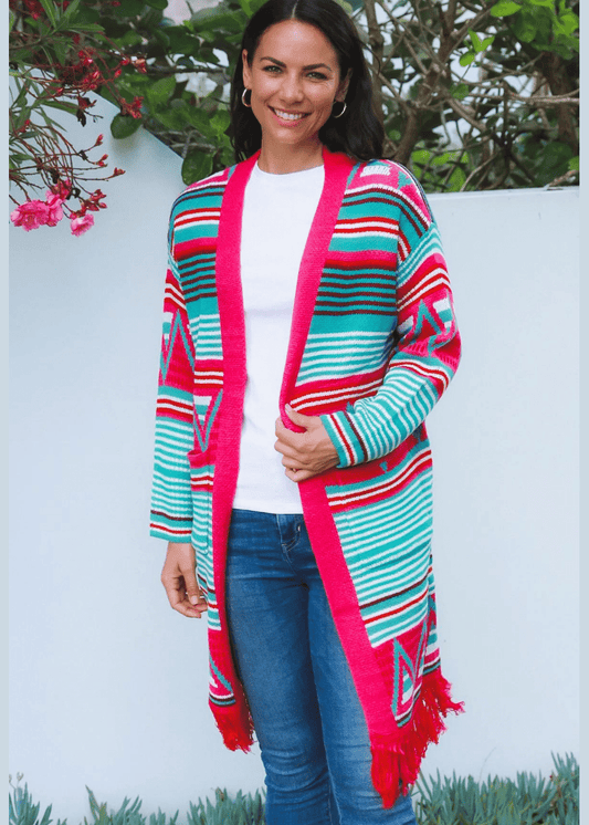 Women wearing a Aztec-Inspired Striped Cardigan with Bold Pink, Turquoise, and Red Geometric Patterns and Fringe Hem