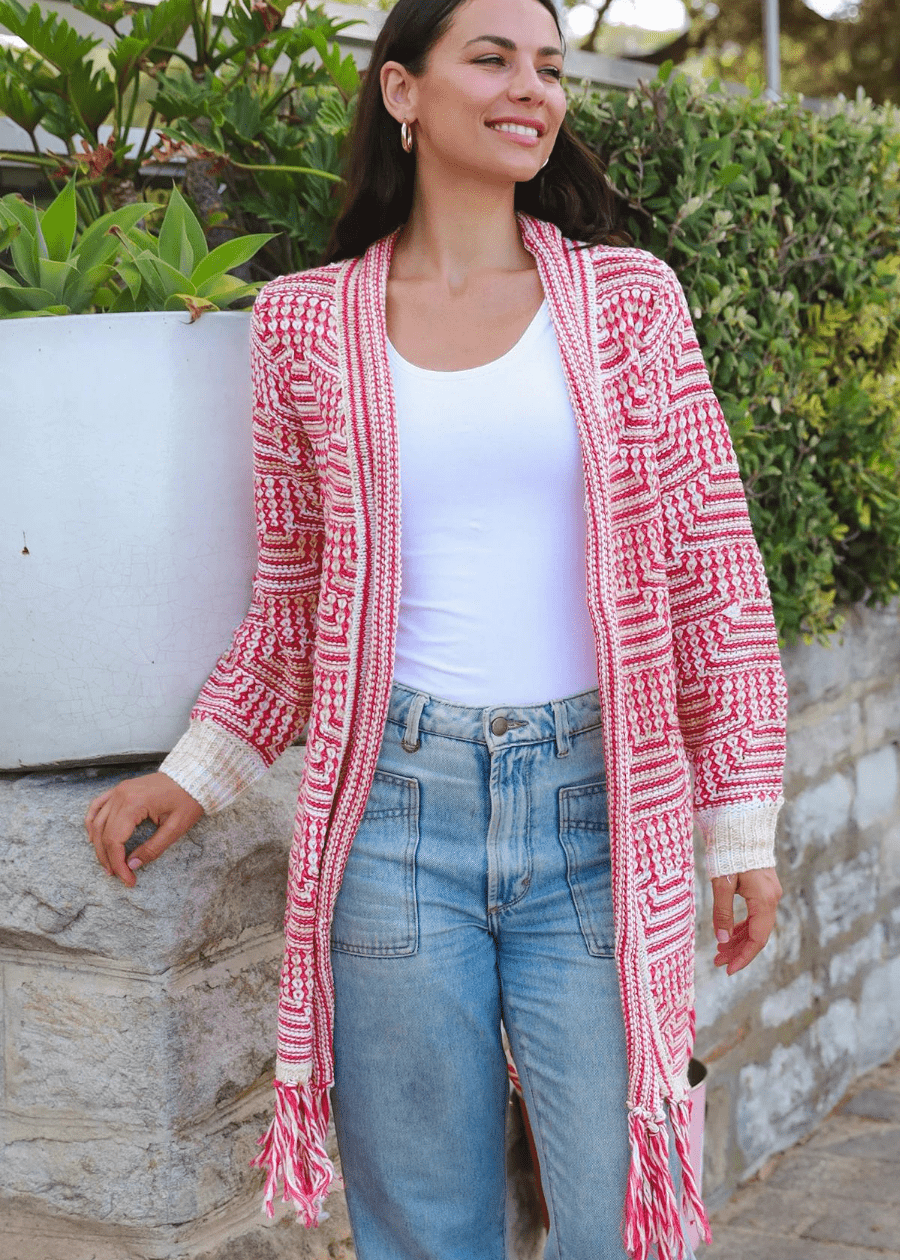 Boho Chic Knit Cardigan with Red Geometric Patterns and Fringe Hem for a Bohemian Look