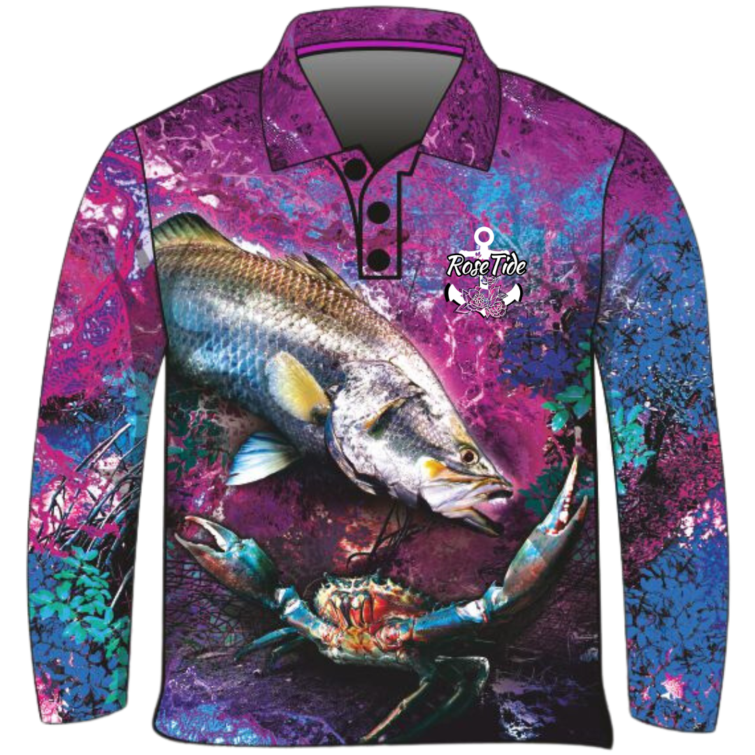 A long sleeve women's fishing shirt with a vibrant, abstract background in purple, blue, and pink tones. The design features a large barra and a crab prominently on the front, along with the "Rose Tide" logo on the chest, which includes an anchor and rose